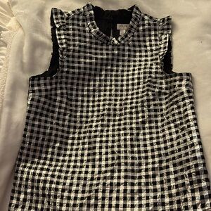 Women’s metallic ruffled top